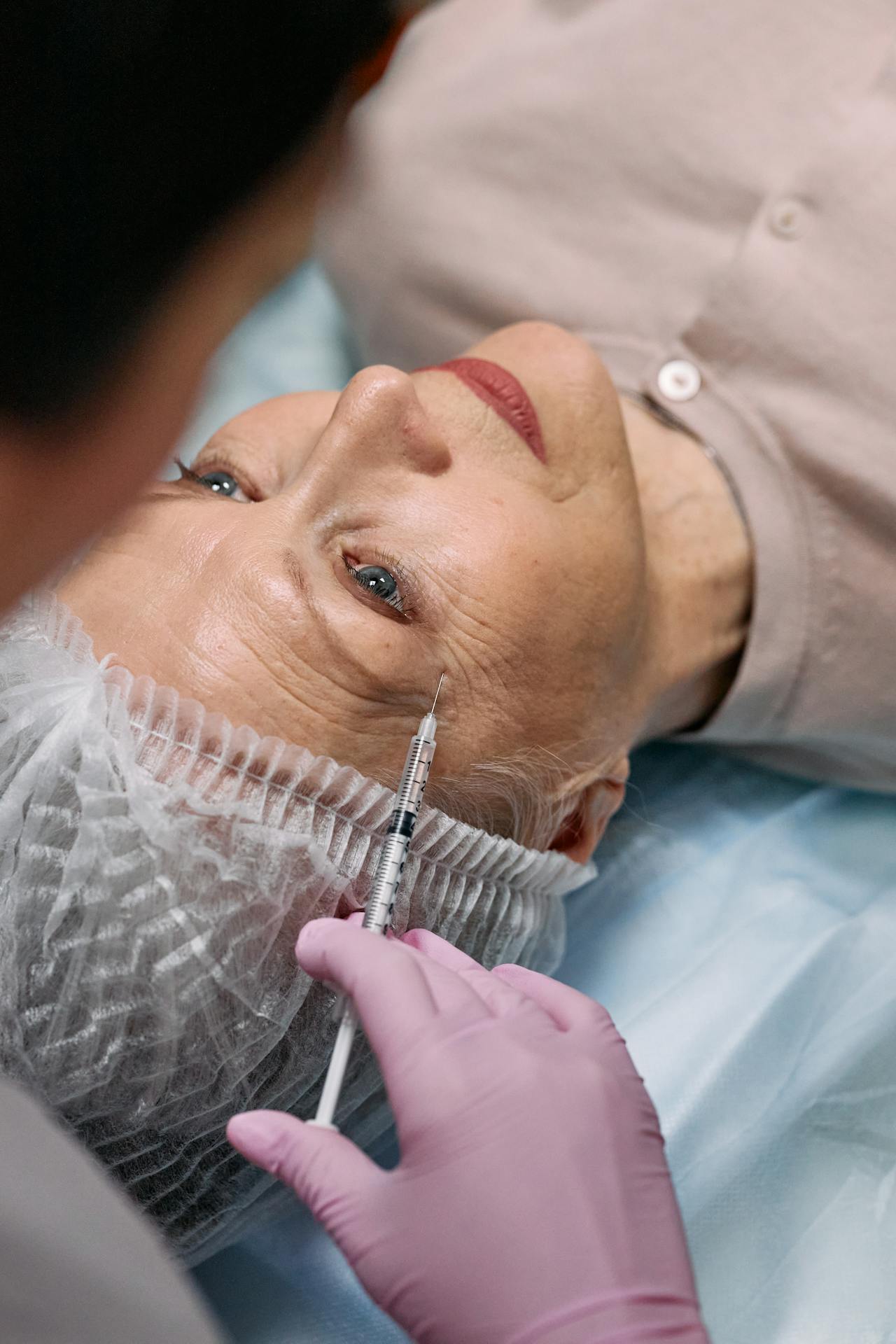 Cosmetic facial injection procedure at dermatology clinic